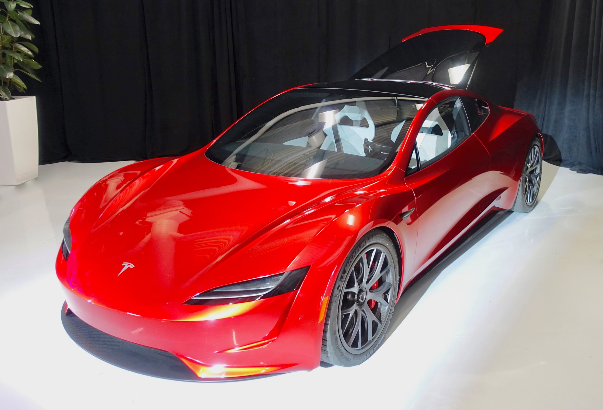 Red Tesla Roadster prototype on stage at its unveiling